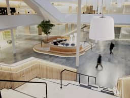 AXIS C1510 from AXIS COMMUNICATIONS - Network Pendant Speaker, mounted in a lobby in an office environment